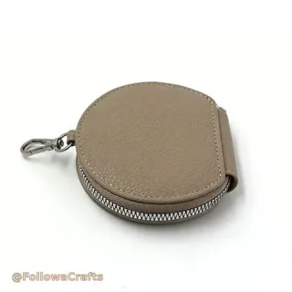 Étui rond pour écouteurs en cuir PU avec logo personnalisé zippé
